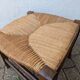 Antique solid wood stool with traditional rush seating – Late 19th century