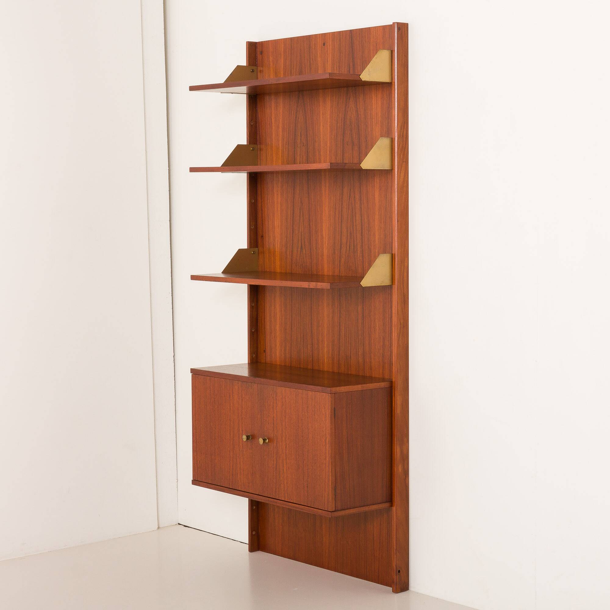 Italian mid-century teak wall unit on panels, 1970s