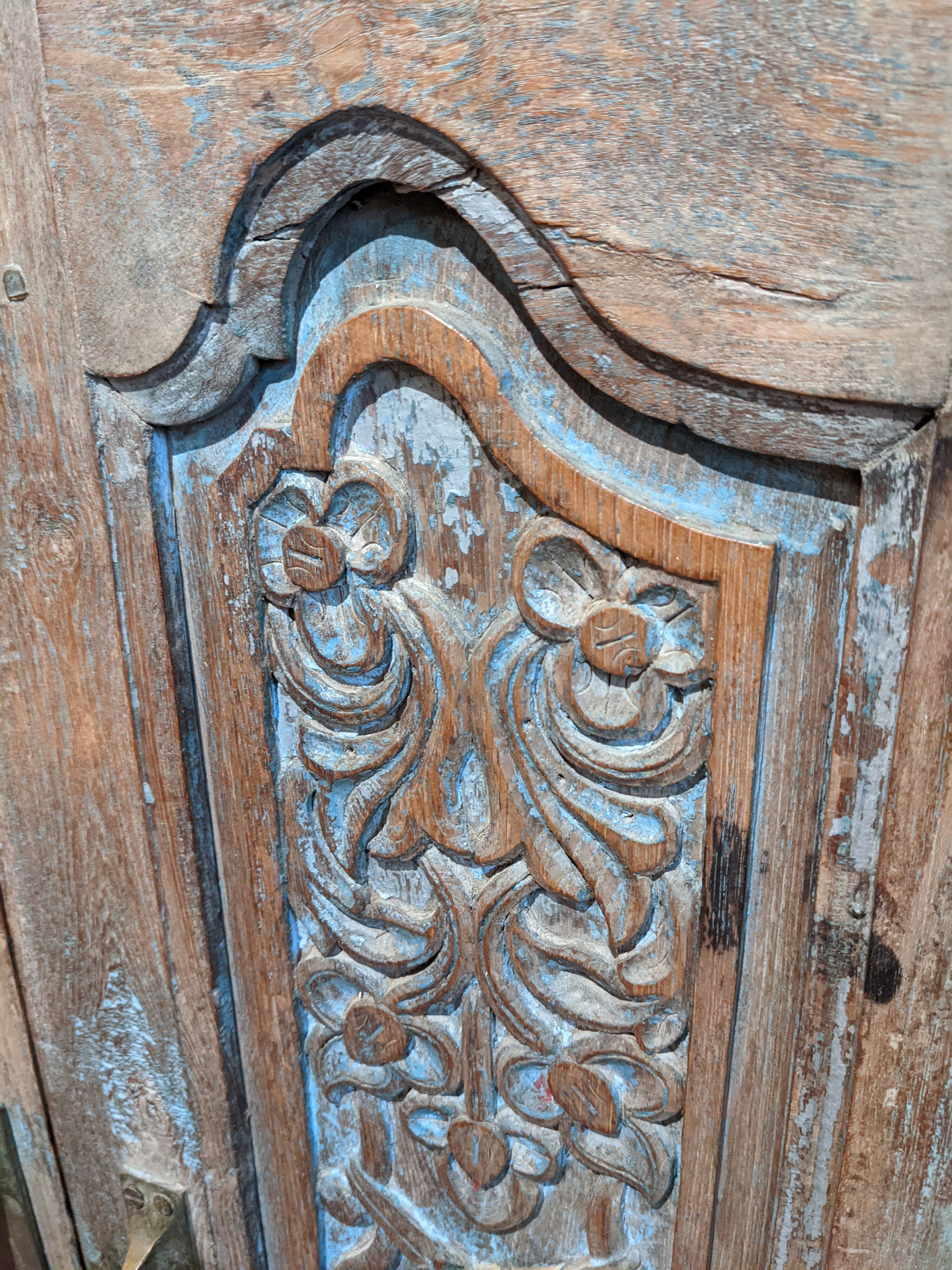 Carved teak cabinet