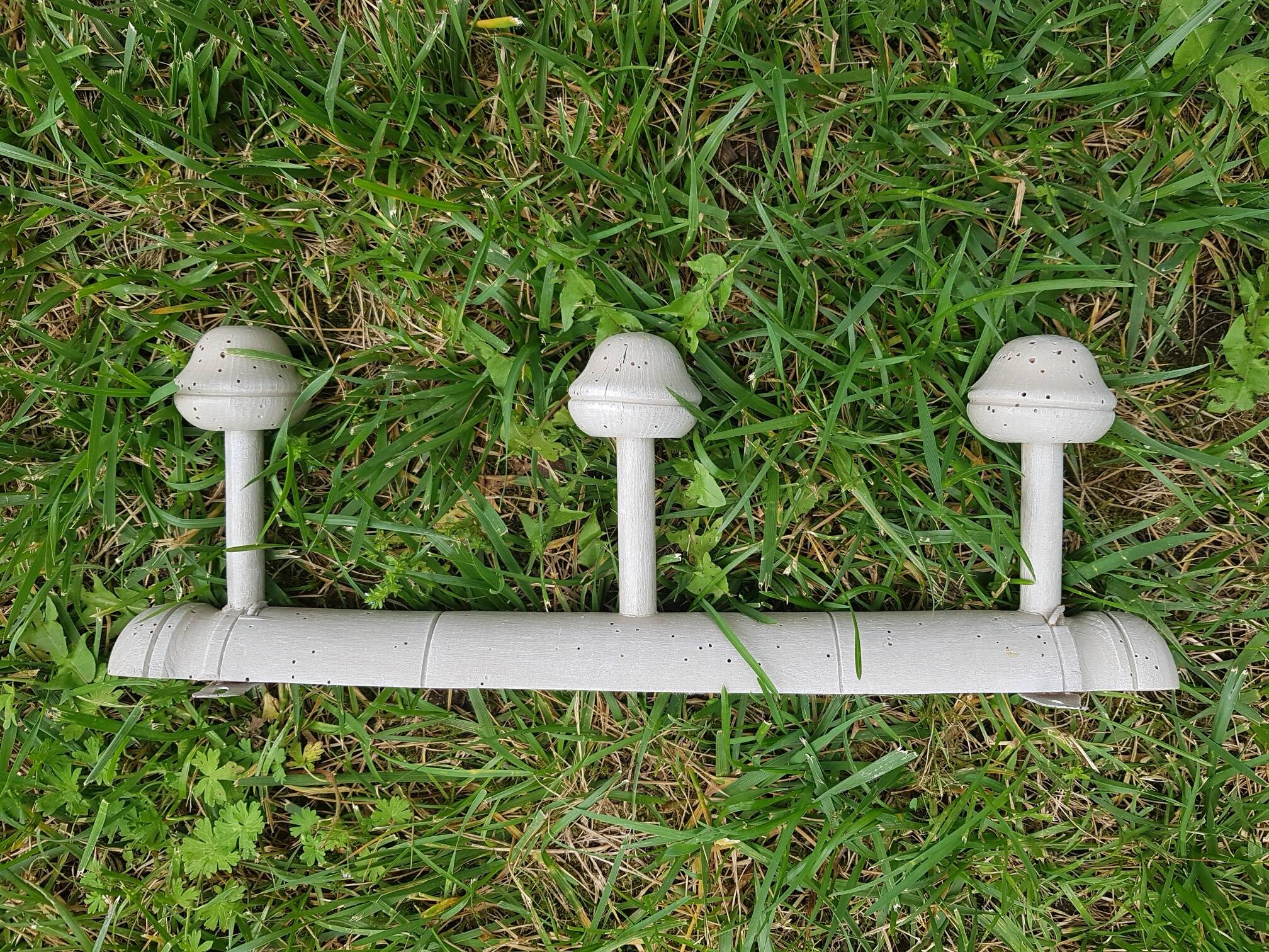 Old wall coat rack with linen patina
