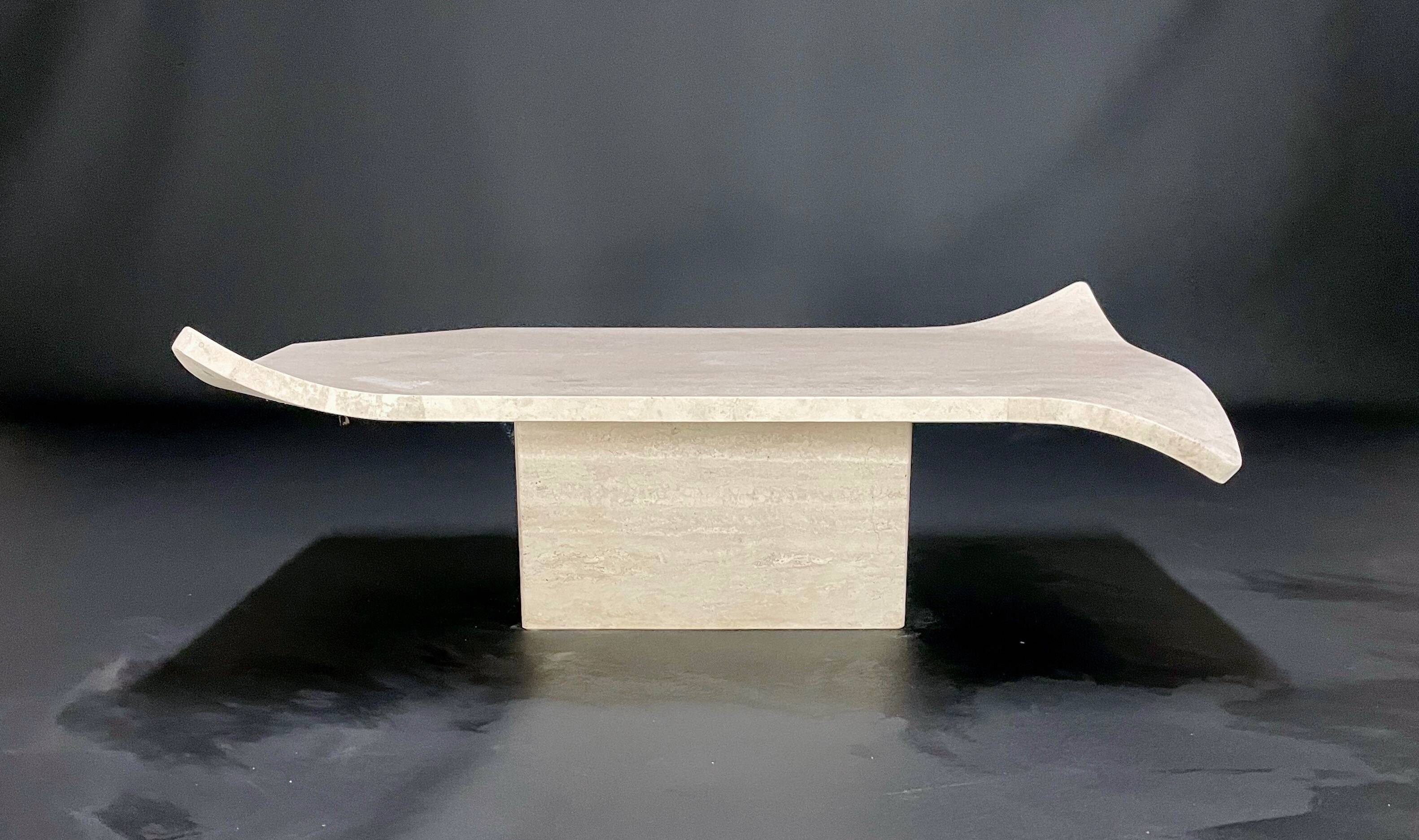 Travertine coffee table with curved corners by Claude Berraldacci. 1990s. France.