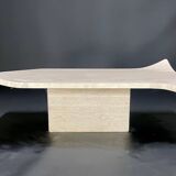 Travertine coffee table with curved corners by Claude Berraldacci. 1990s. France.