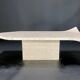 Travertine coffee table with curved corners by Claude Berraldacci. 1990s. France.