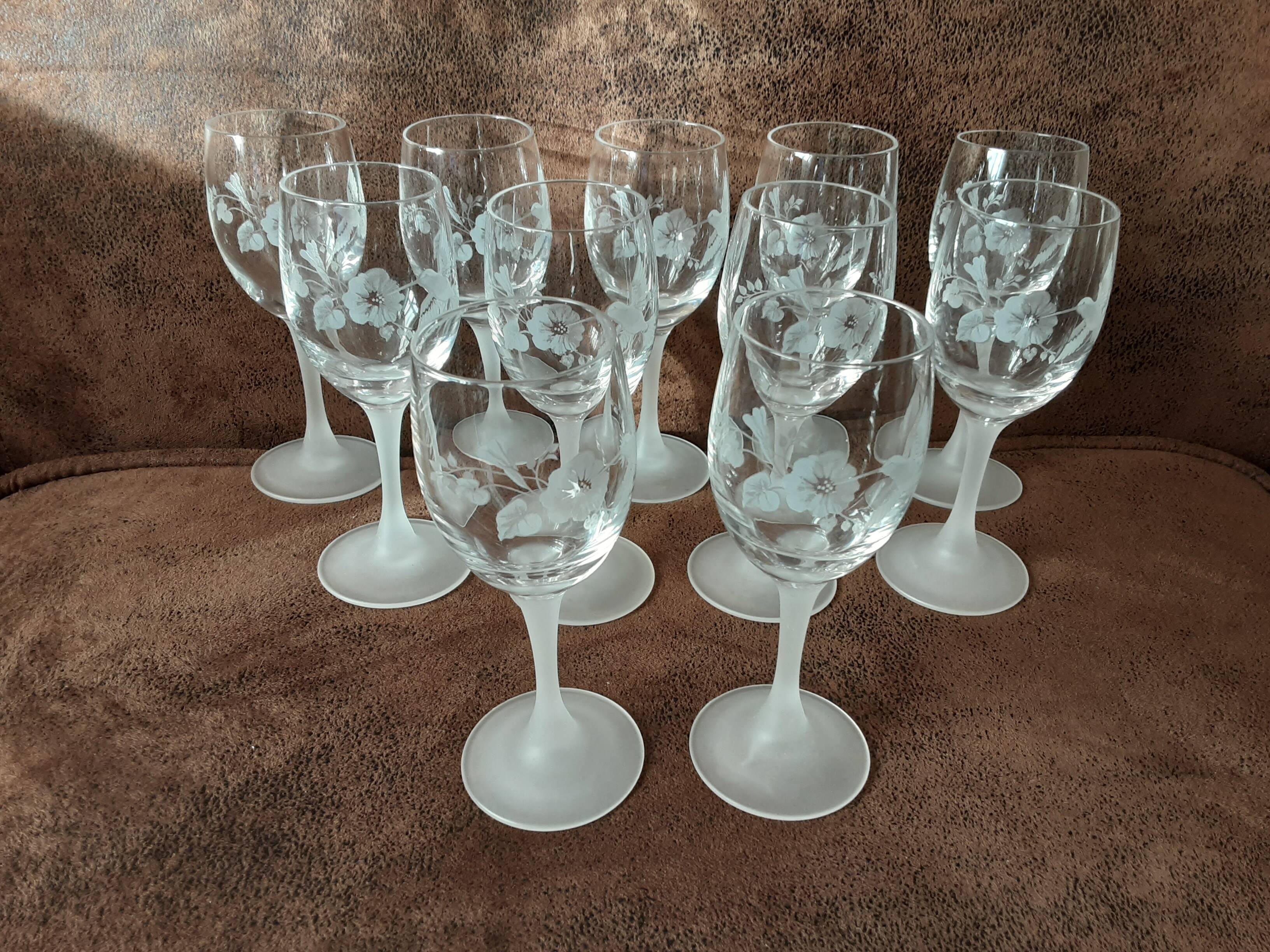 Set of 11 crystal footed digestif glasses