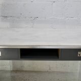 Modernist console, 1960s, glass base, wooden and fabric top.