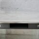 Modernist console, 1960s, glass base, wooden and fabric top.