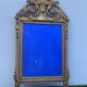 Antique mirror with gilded wood pediment, Louis XVI style
