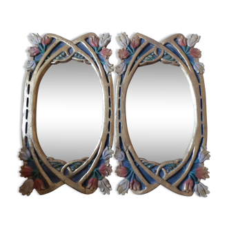 Duo of mirrors in gilded wood and polychrome