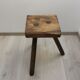 Old wooden stool tripods