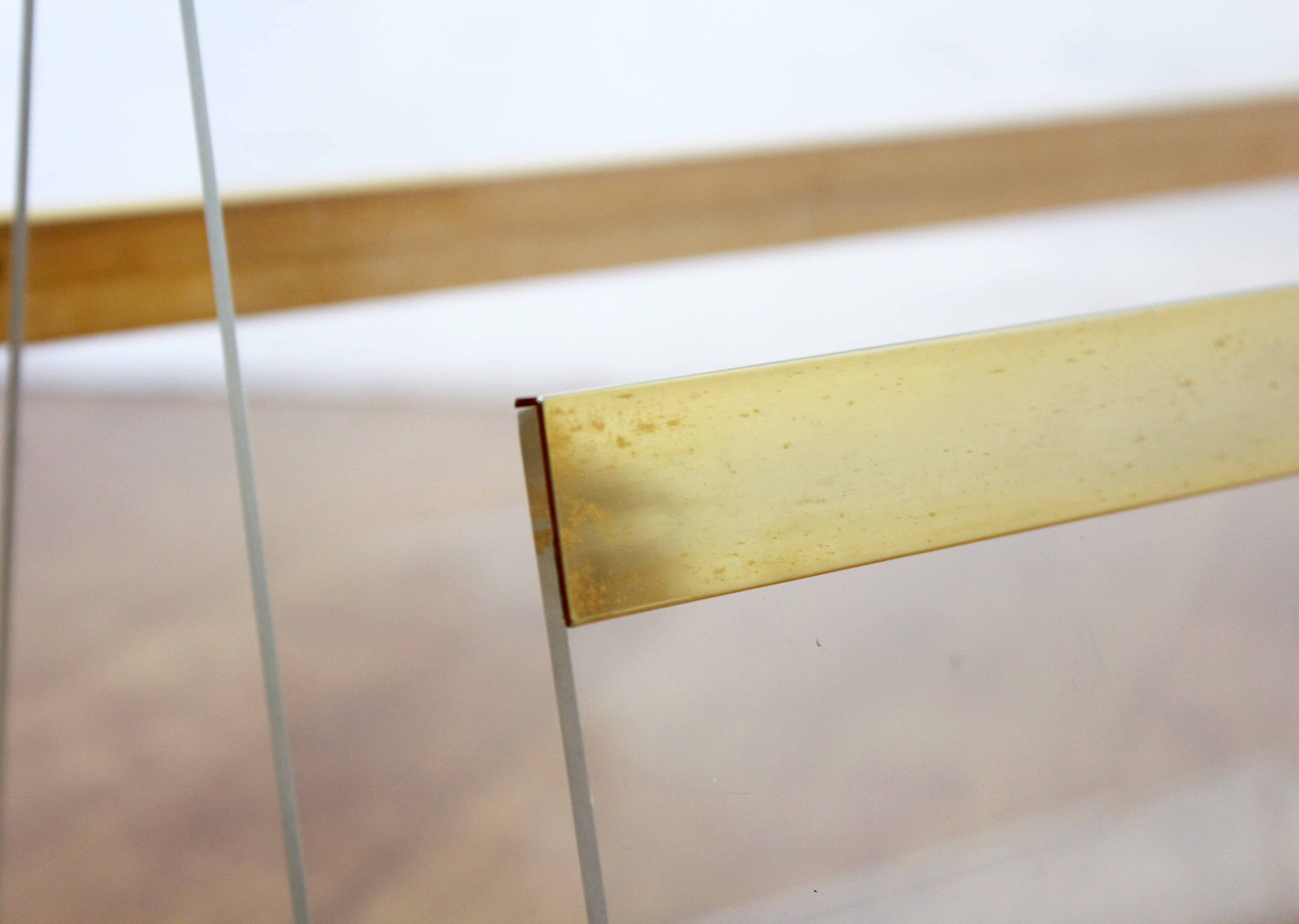 Plexiglas and brass magazine holder