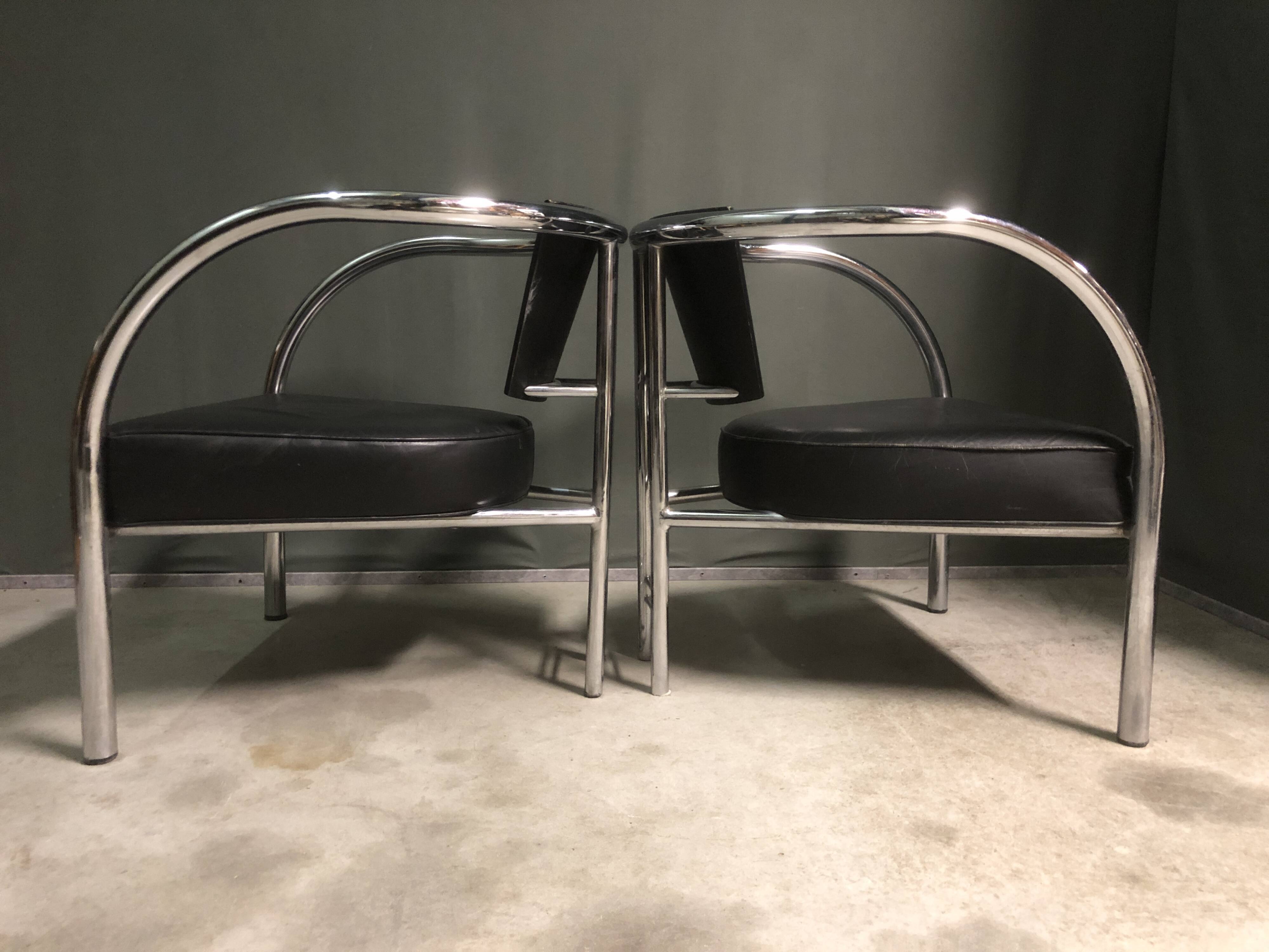A pair of petite low armchairs by ronald cecil sportes for lumen center, 1987