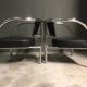 A pair of petite low armchairs by ronald cecil sportes for lumen center, 1987