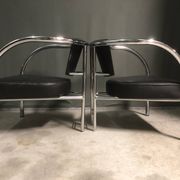A pair of petite low armchairs by ronald cecil sportes for lumen center, 1987
