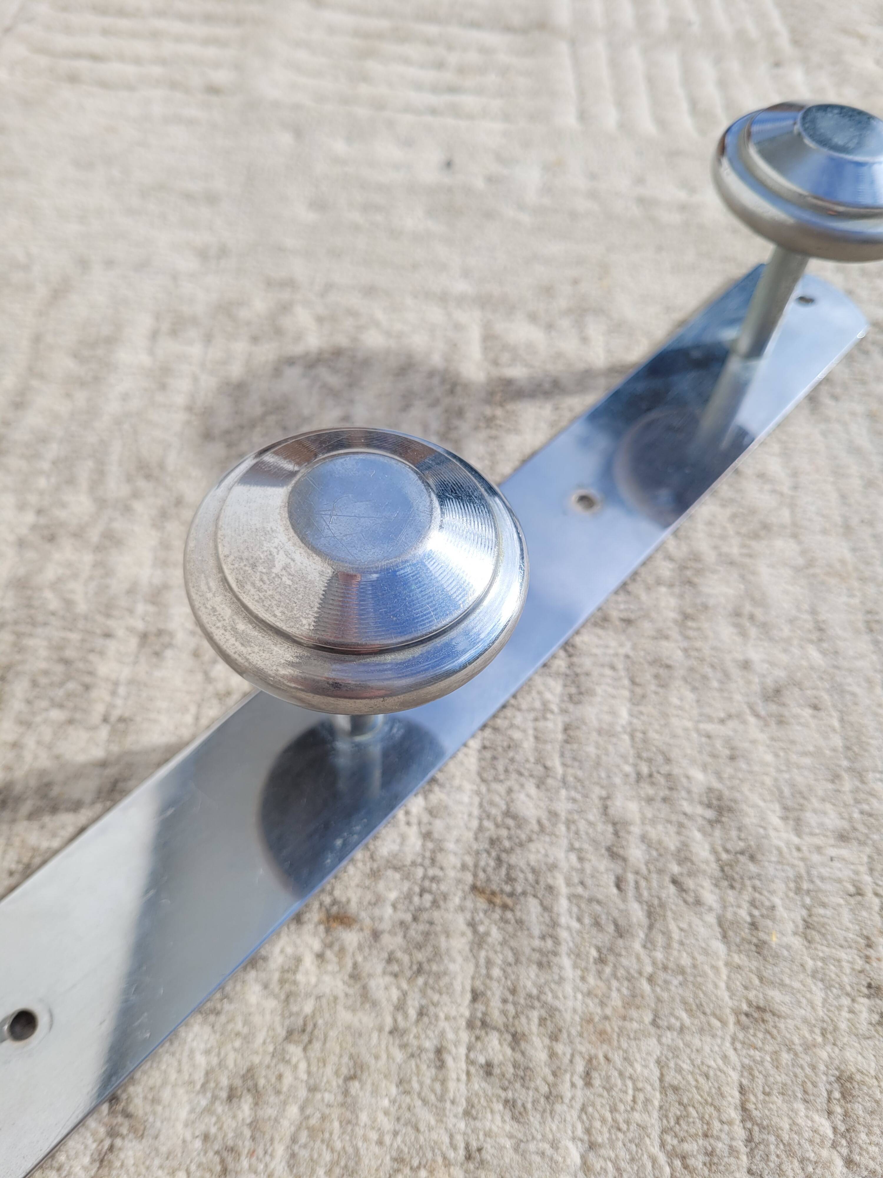 Wall-mounted coat rack circa 1950