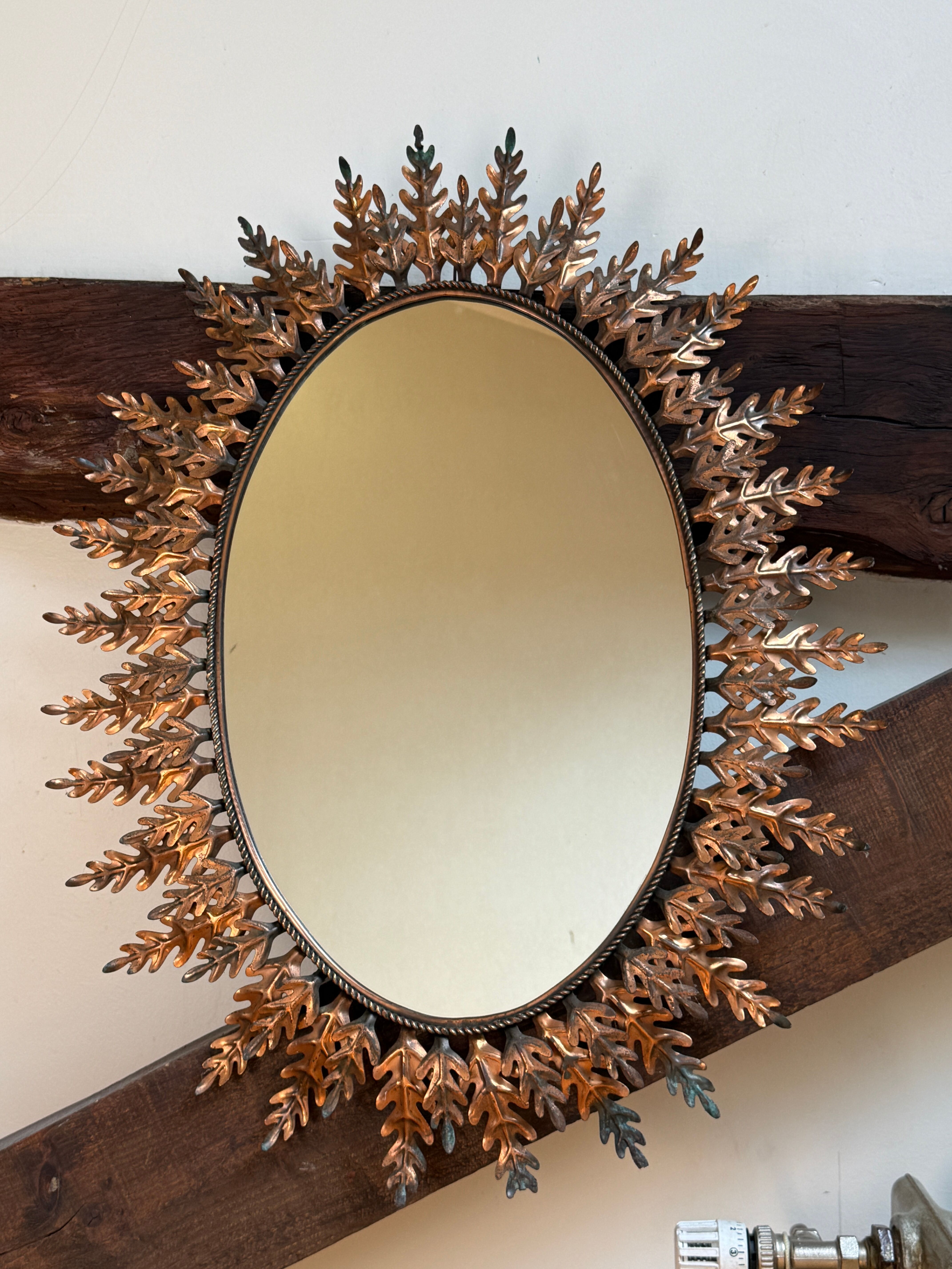 Oval sun mirror wrought iron from the 1950s Italy
