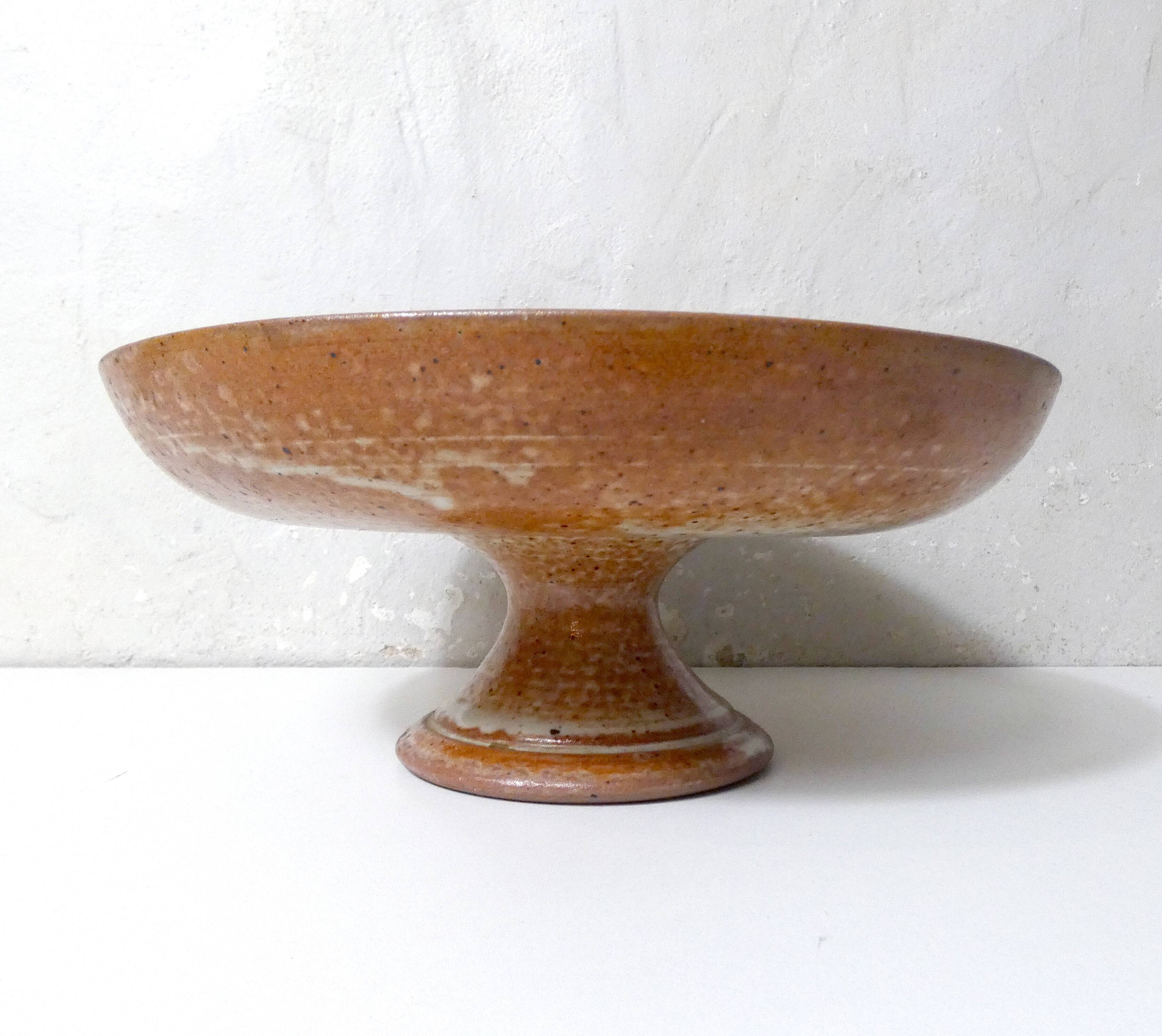 Large vintage stoneware compote dish with a footed plate