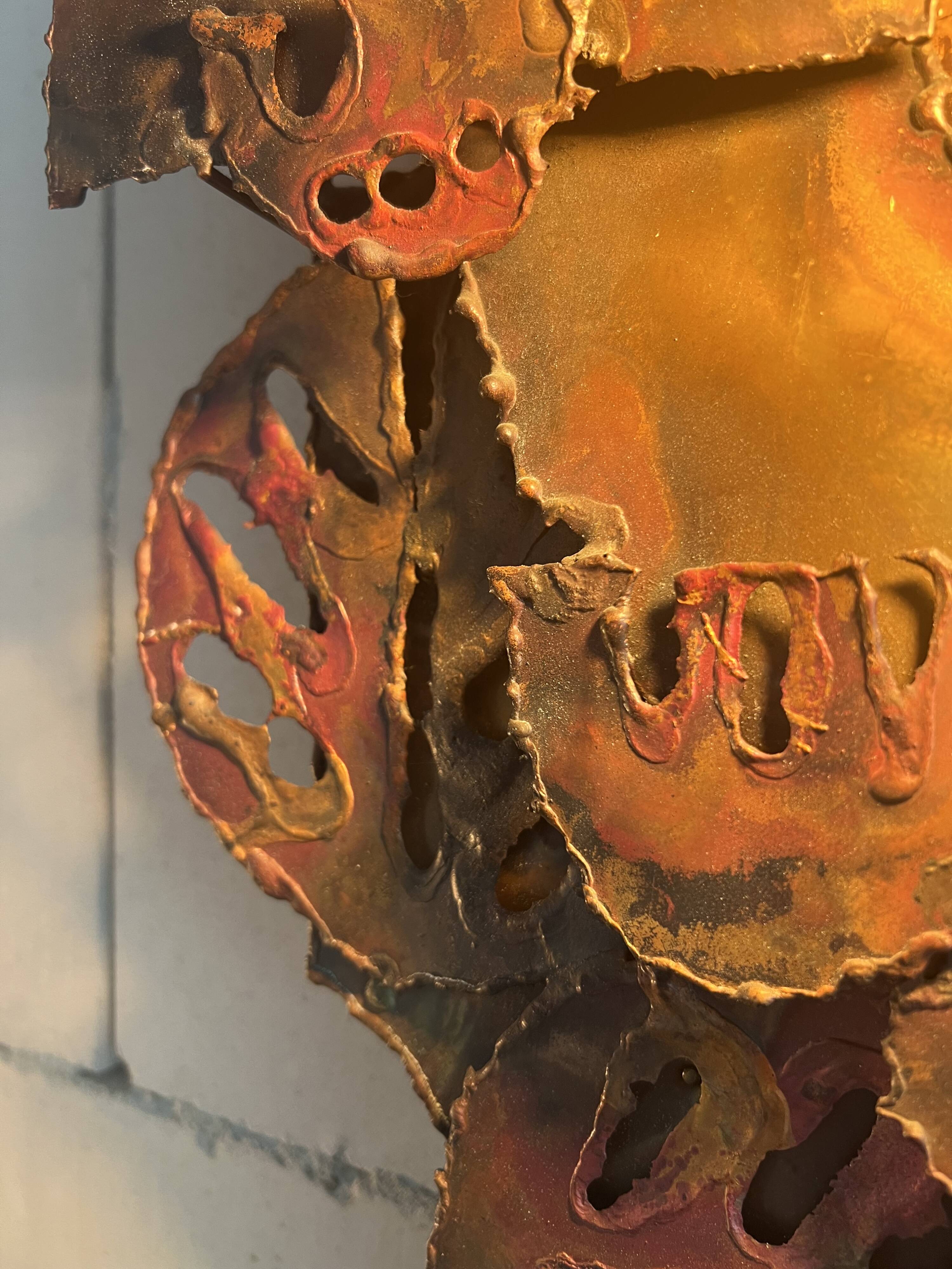 Raw expressive wall sconces by Francesco Pasinato