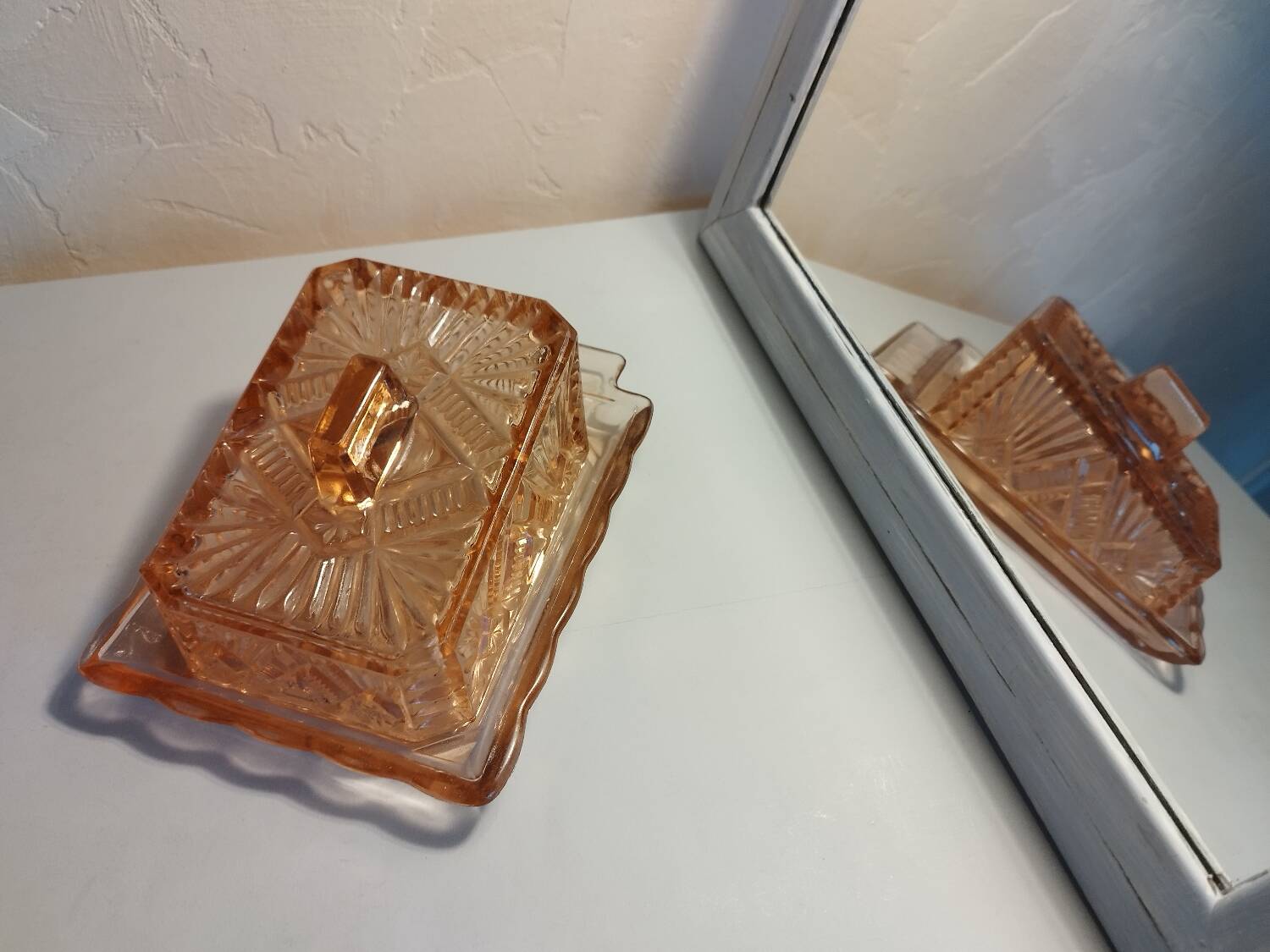 Pink glass butter dish