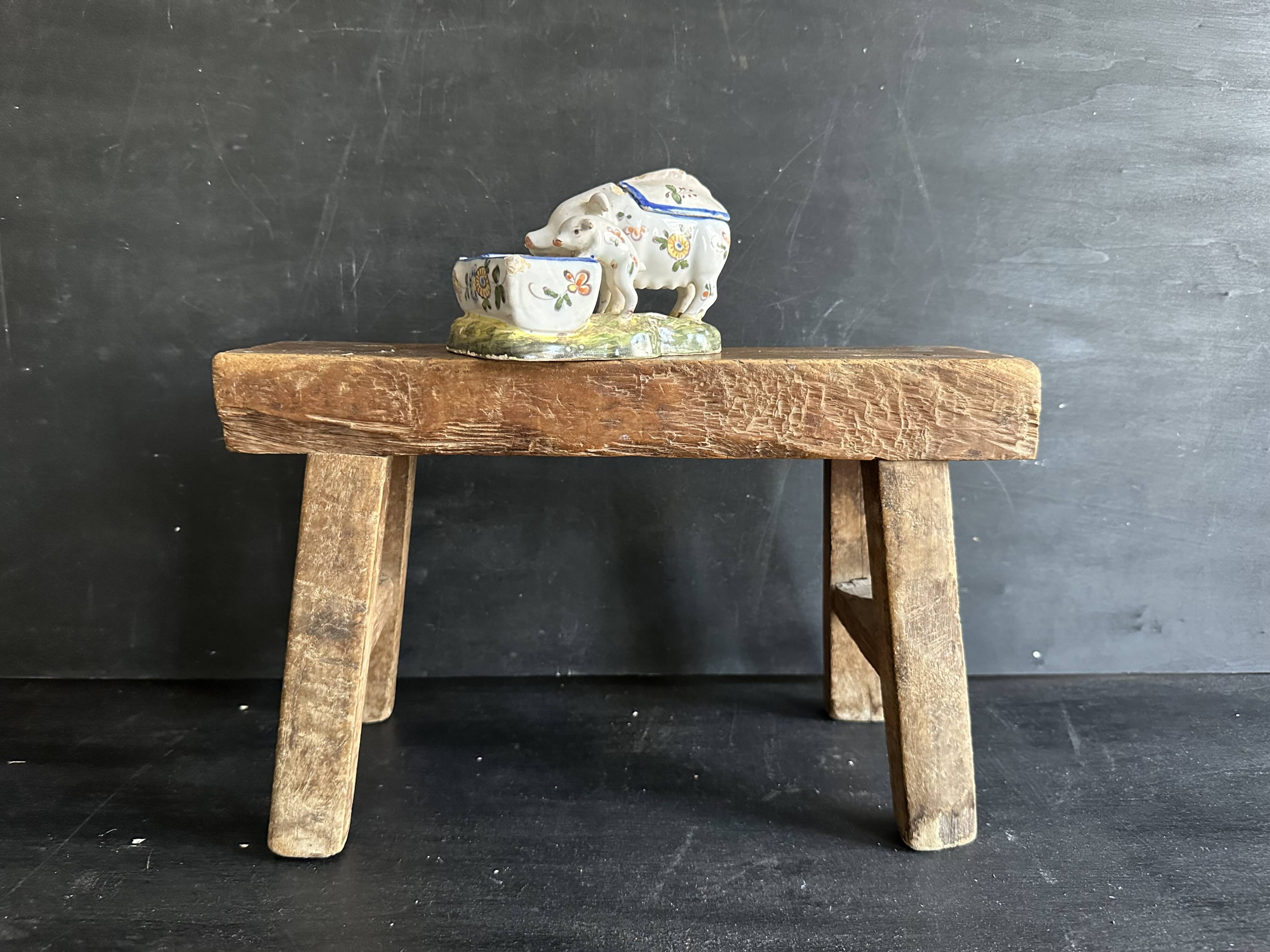 Antique earthenware pig box, salt cellar or mustard pot, floral decoration.
