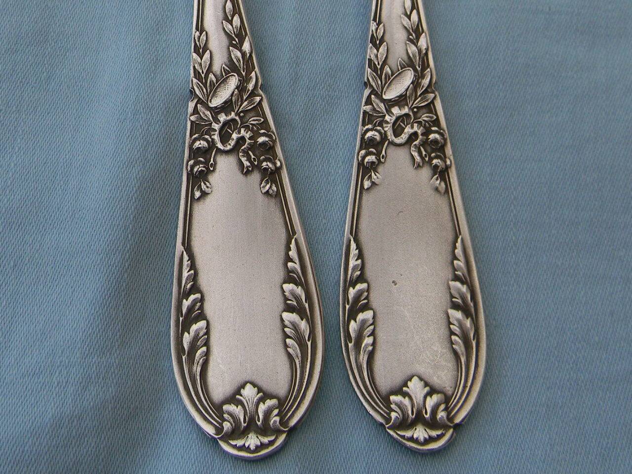 SFAM silver metal salad servers.