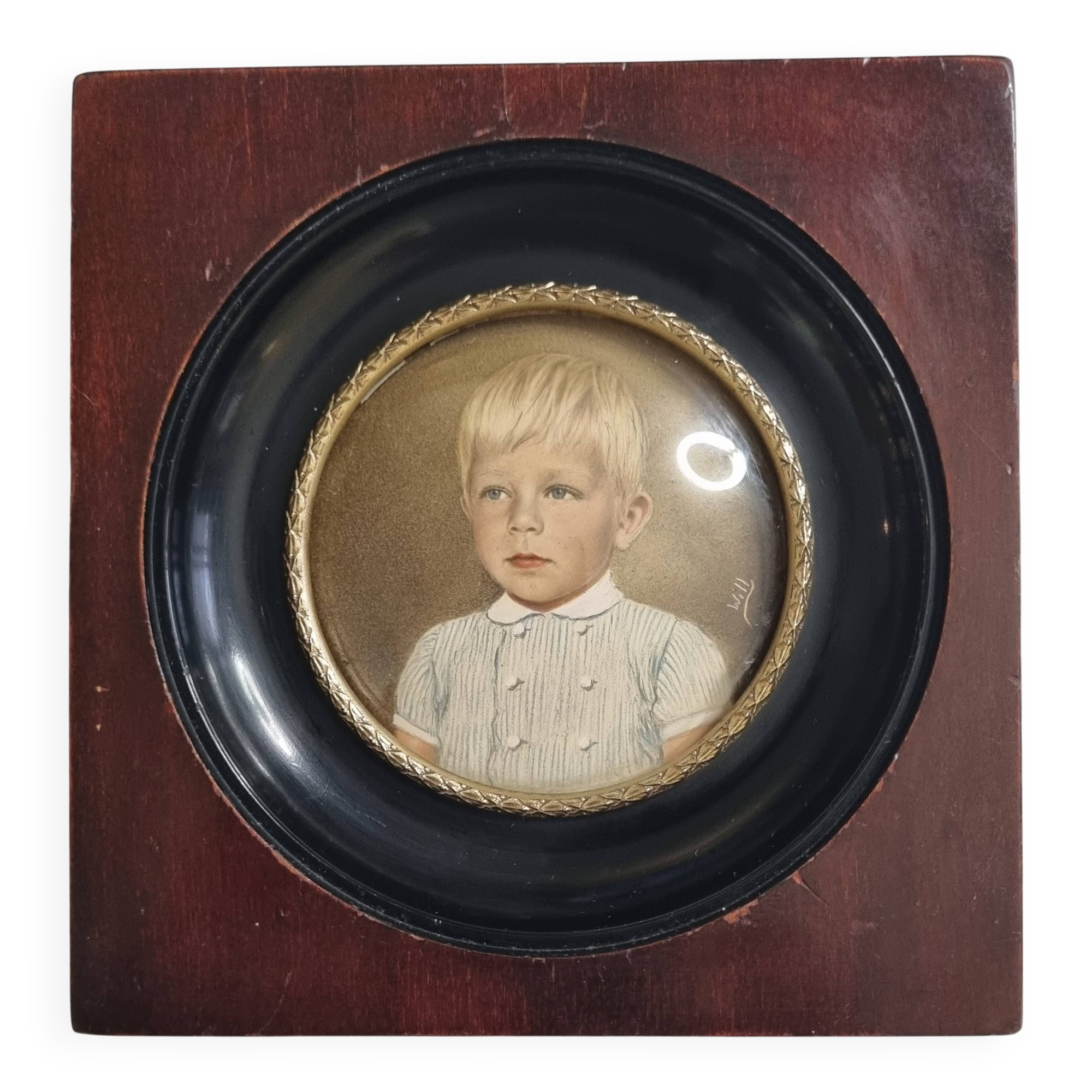 Miniature portrait of a young boy signed, wooden frame with convex glass, 12x12 cm.