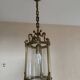 Golden hanging lantern and glass