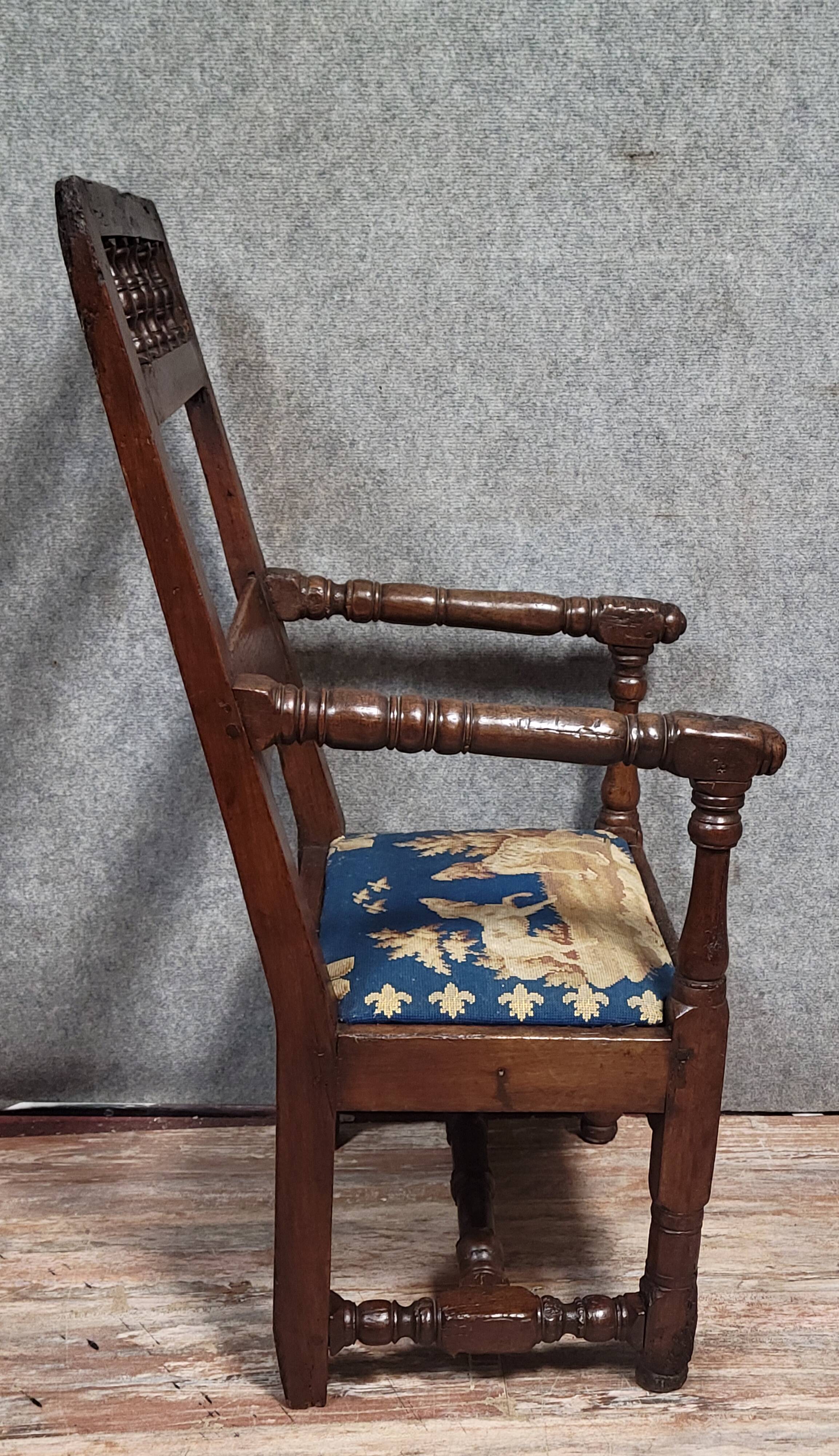 Louis XIII period armchair in solid wood