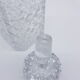 Square-shaped crystal carafe has spikes