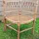 Corner chair in beech, caned seat from the early 20th century.