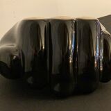 Black ceramic ashtray left hand