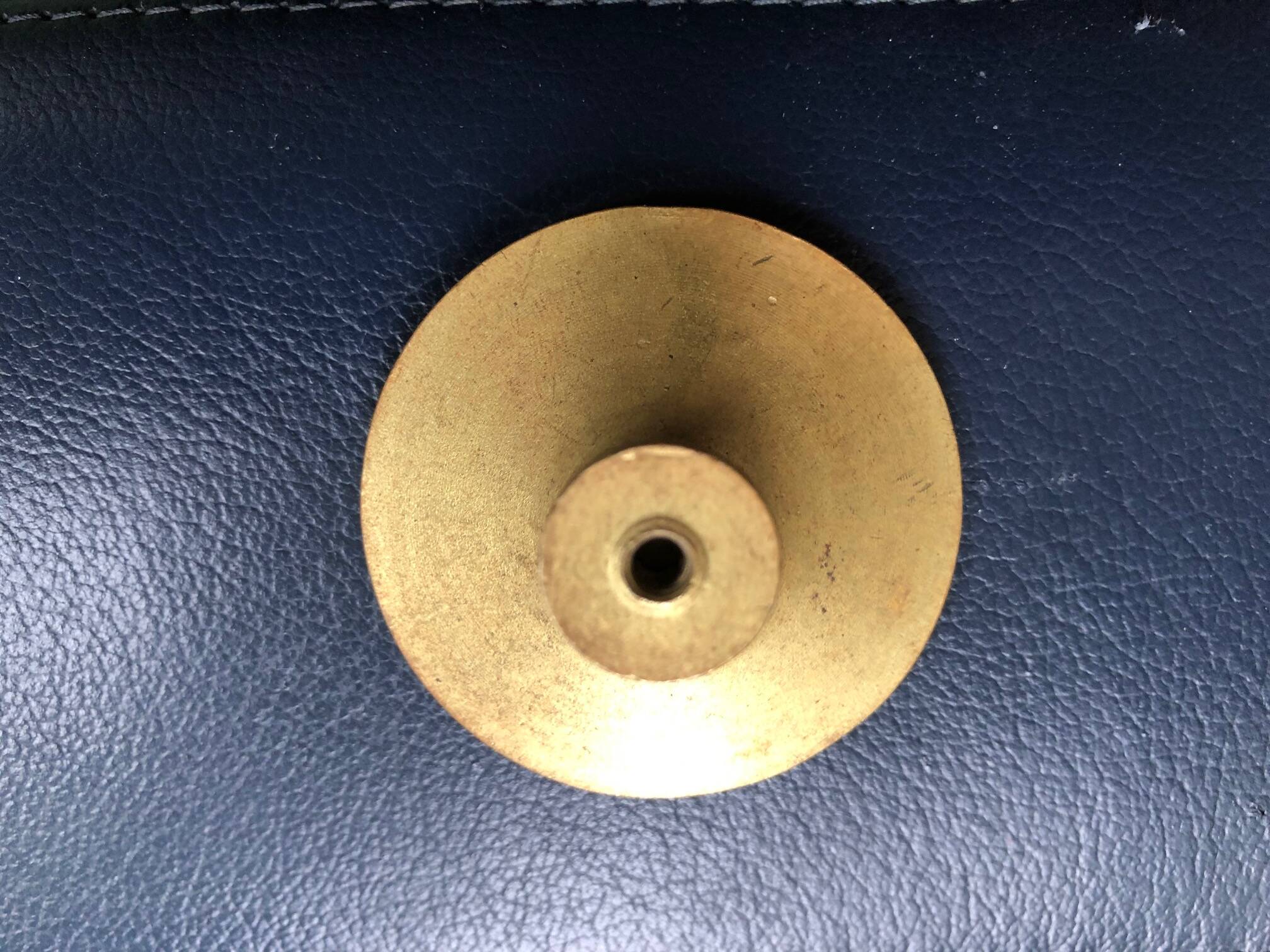 Large solid brass handle knob for door or furniture.