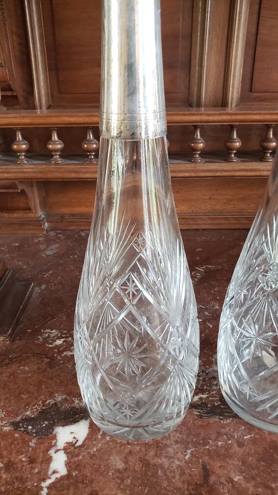 Pair of crystal and metal decanters