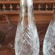 Pair of crystal and metal decanters
