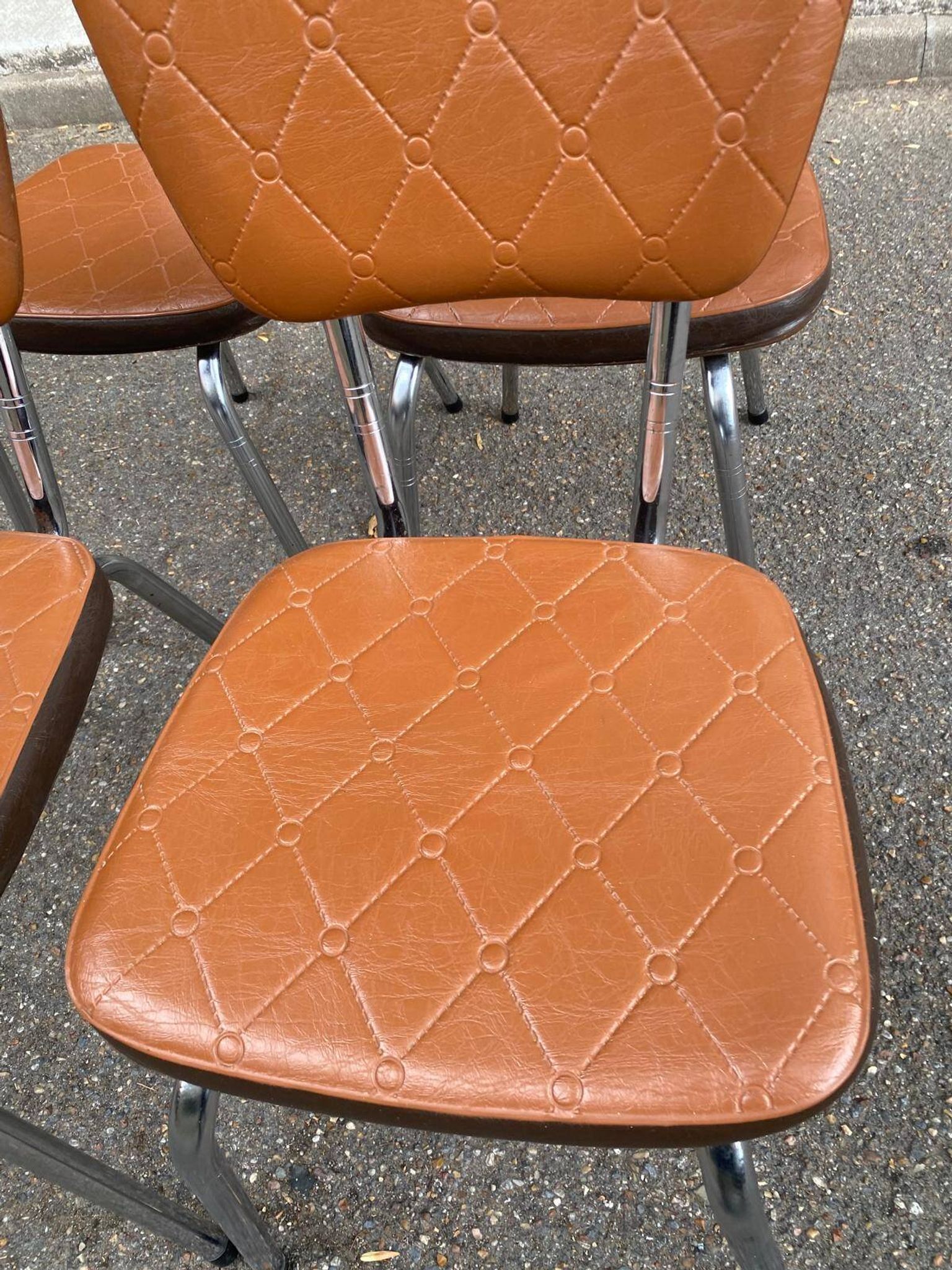 Set of 4 vintage camel faux leather quilted chairs with chrome metal by Soudexvinyl from the 70s.