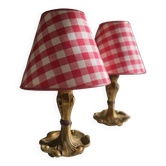 Pair of small lamps in gilded bronze by Petitot and red gingham lampshades.