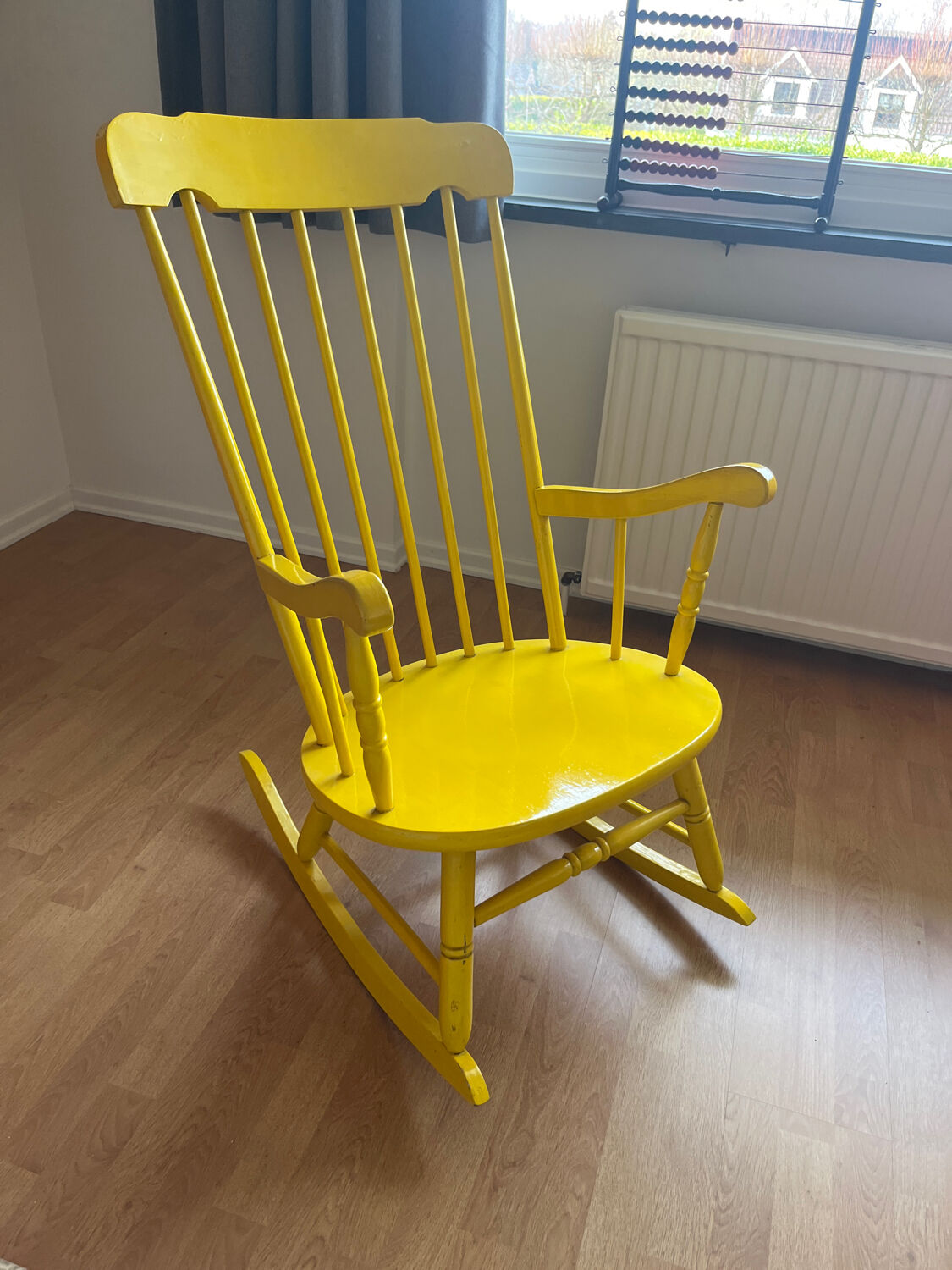 Vintage yellow rocking chair