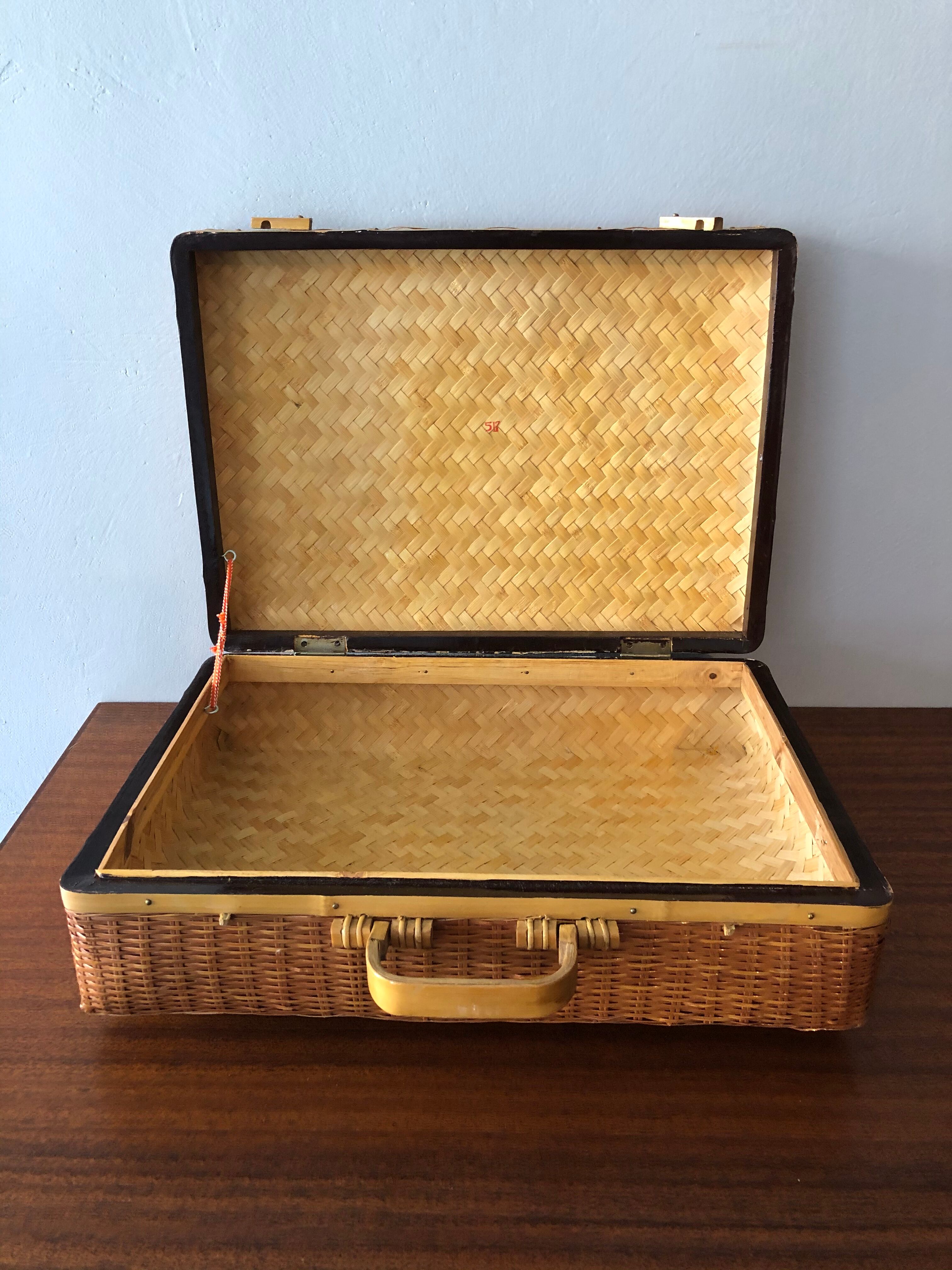 Vintage braided wicker suitcase