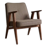 Fauteuil vintage taupe mélangé avec rembourrage en confettis rénové