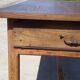 Old farmhouse table made entirely of restored solid oak.