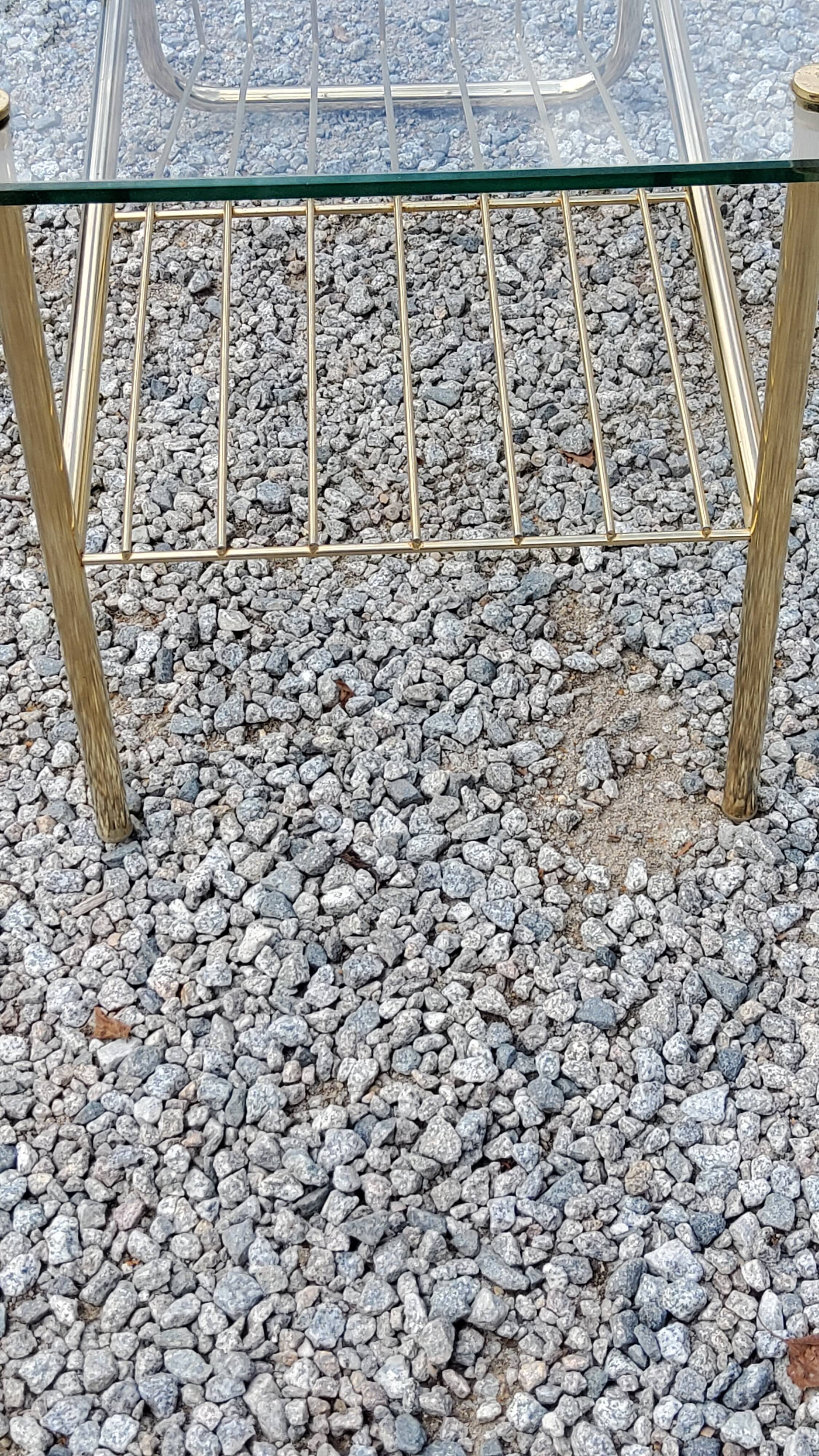 Coffee table from the 60s top glass base metal gilded