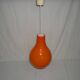 Orange teardrop pendant light from the 1970s