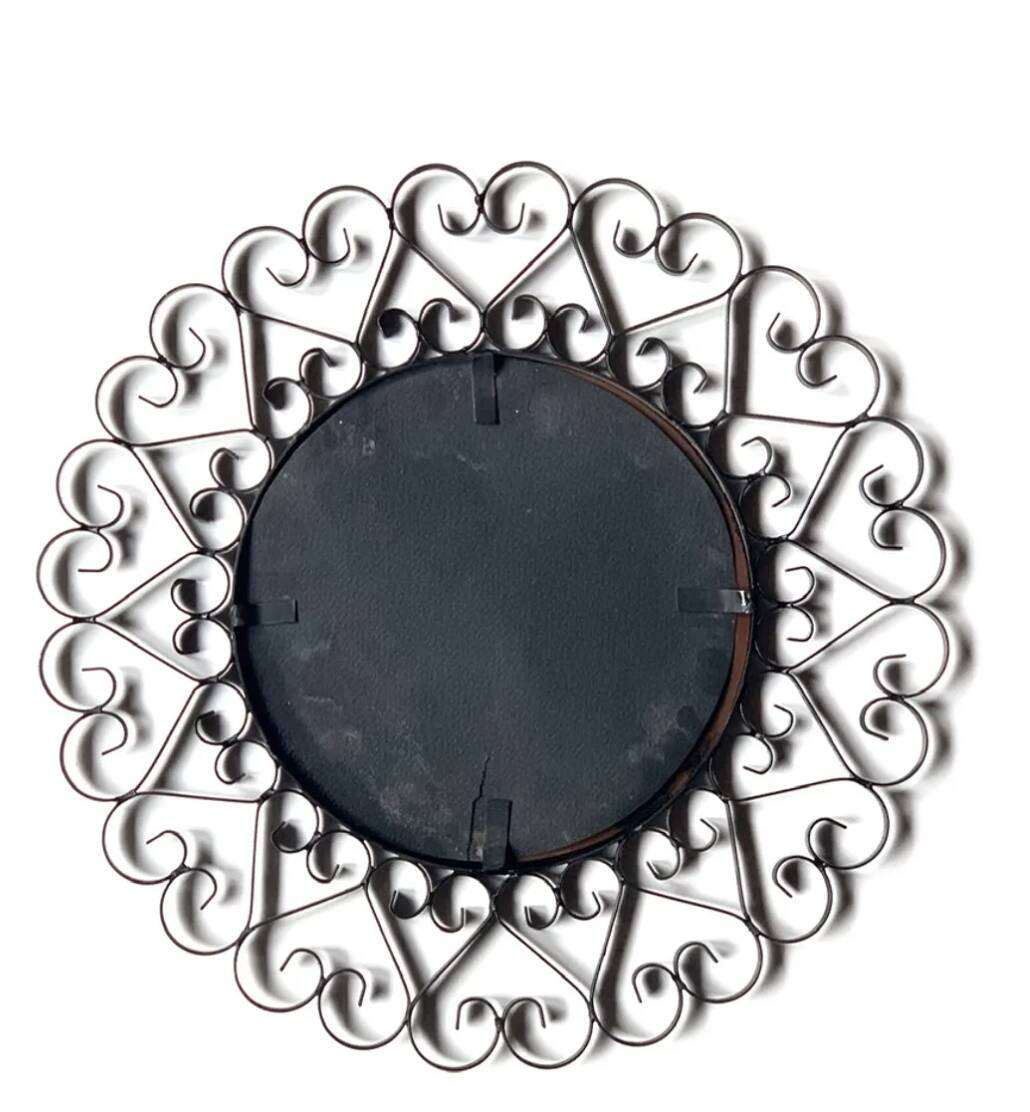 Chaty Vallauris round black metal mirror, 1960s