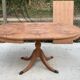 Extendable round dining table with central leg renovated in raw wood 205cm