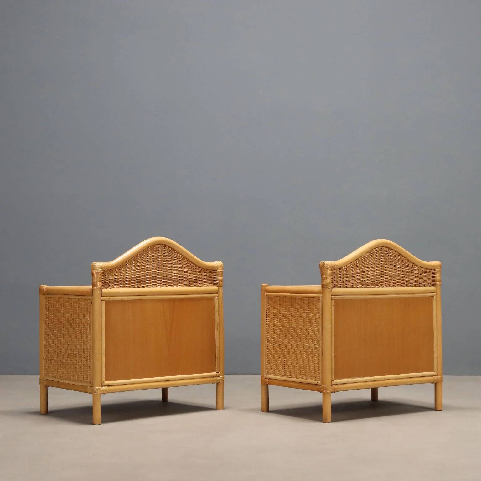 Pair of woven wicker bedside tables from the 1980s.