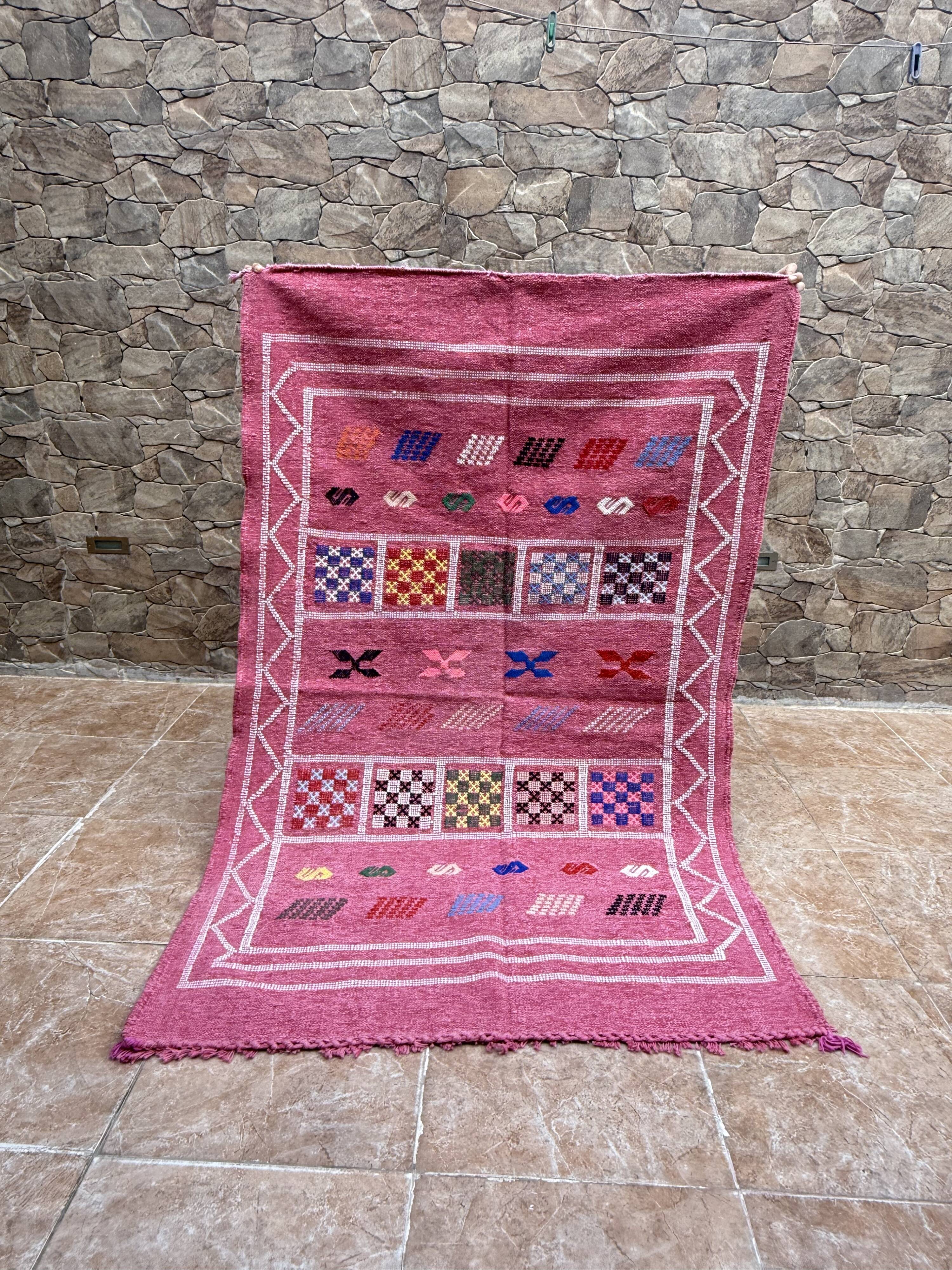 Handmade Moroccan wool rug: Berber Azilal style, geometric pattern.