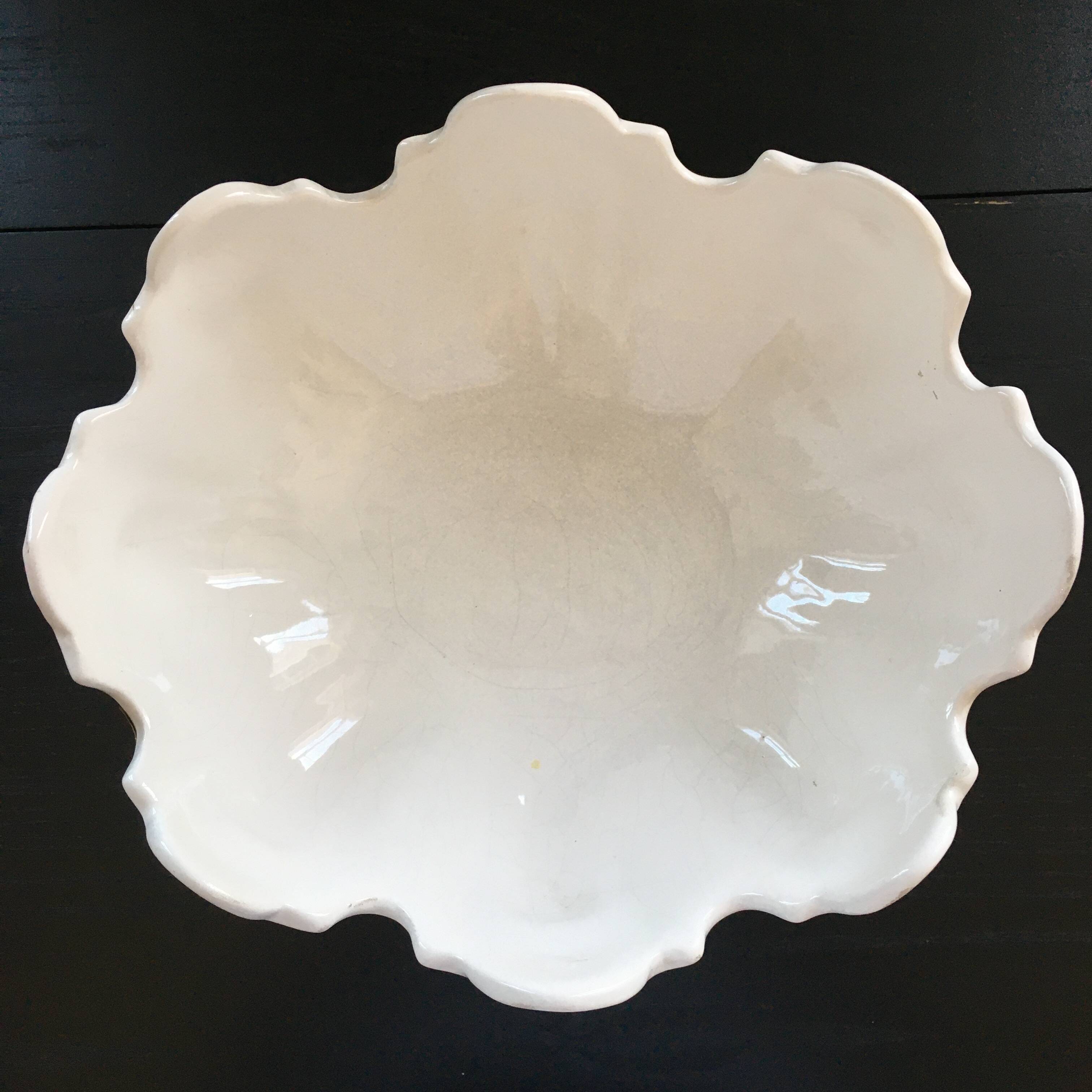 Large white scalloped cup