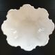 Large white scalloped cup