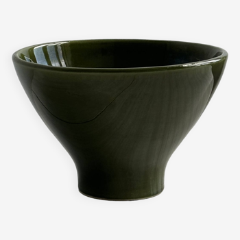 Dark green salad bowl.