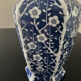 Vintage porcelain vase with white and blue decor