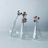 Set of three Pyrex glass chemistry bottles